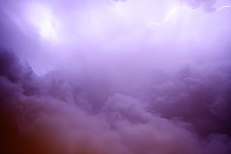 Purple Lightning Storm Over Dark Clouds