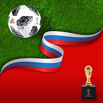 2018 FIFA World Cup Russia Soccer Ball and Trophy on Grass