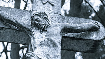 Weathered Stone Crucifixion Sculpture In Black And White