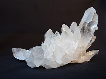 Clear Quartz Crystal Cluster on Black Background