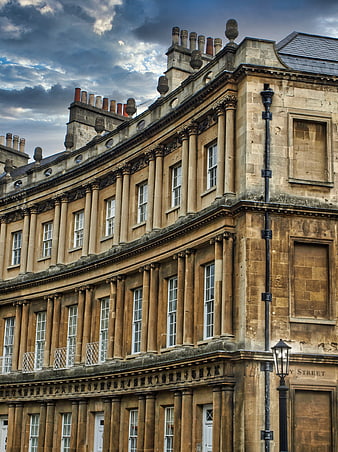 Georgian architecture facade with dramatic cloudy sky