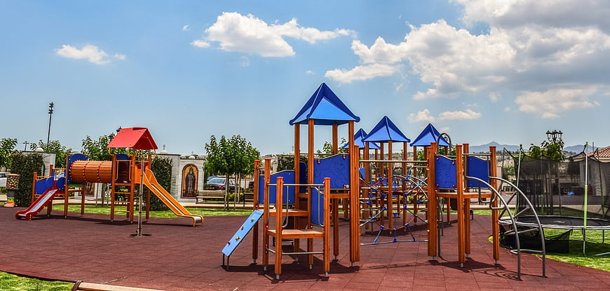 Modern Wooden Playground Equipment In Sunny Park