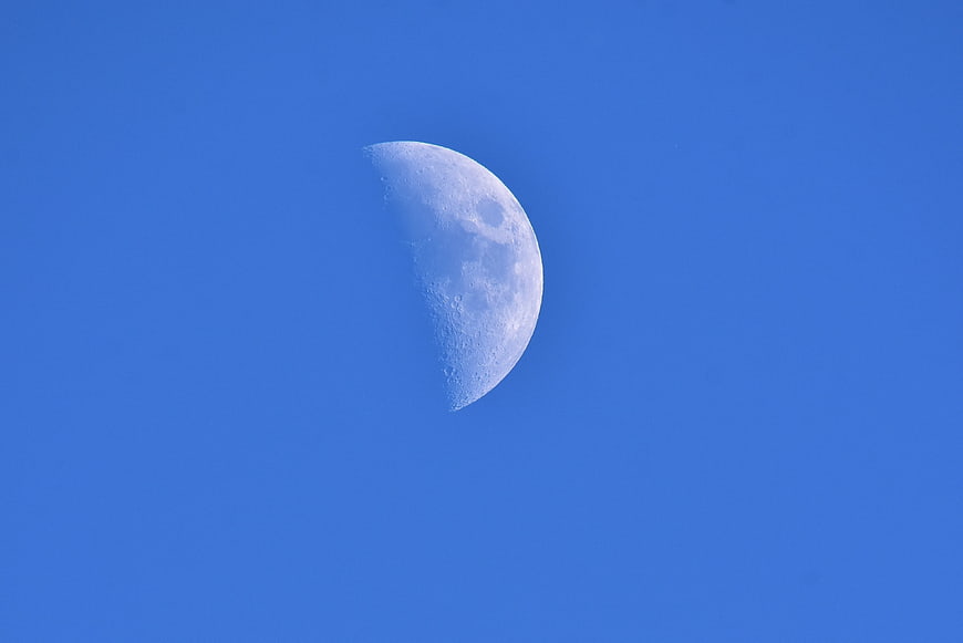 Half Moon in Blue Sky