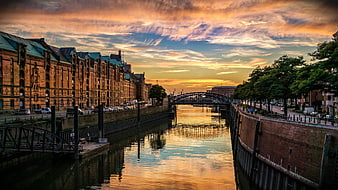Hamburg Speicherstadt Canal at Golden Hour with Historic Brick Warehouses