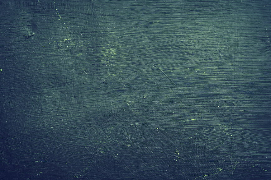 Dark Blue Textured Chalkboard Background with Scratches