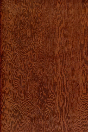 Close-up of rich brown wood grain texture background