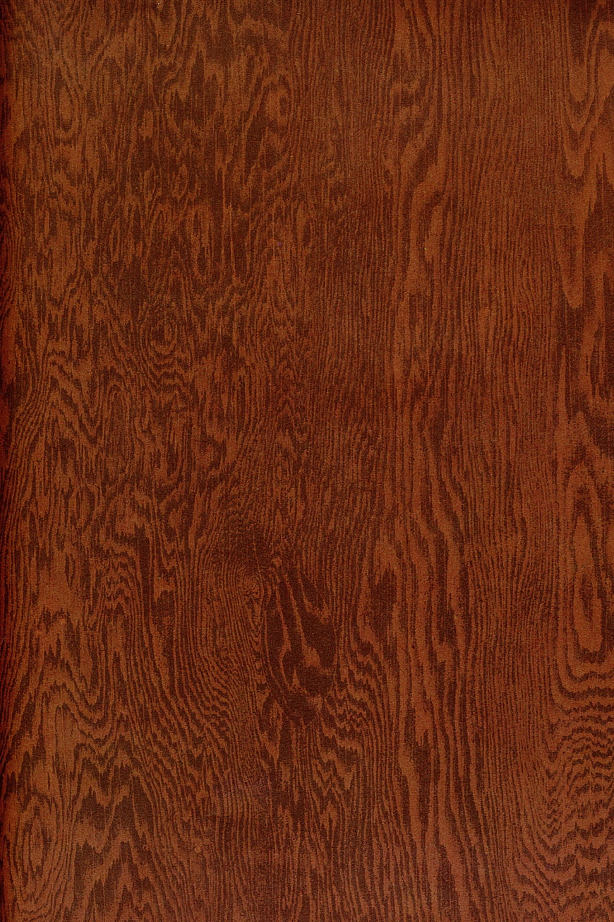 Close-up of rich brown wood grain texture background