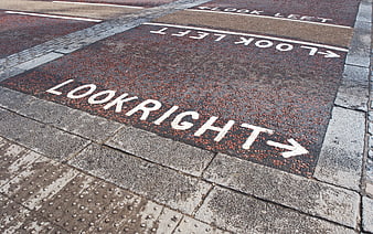 Look Right and Look Left Road Markings on Urban Street Crossing