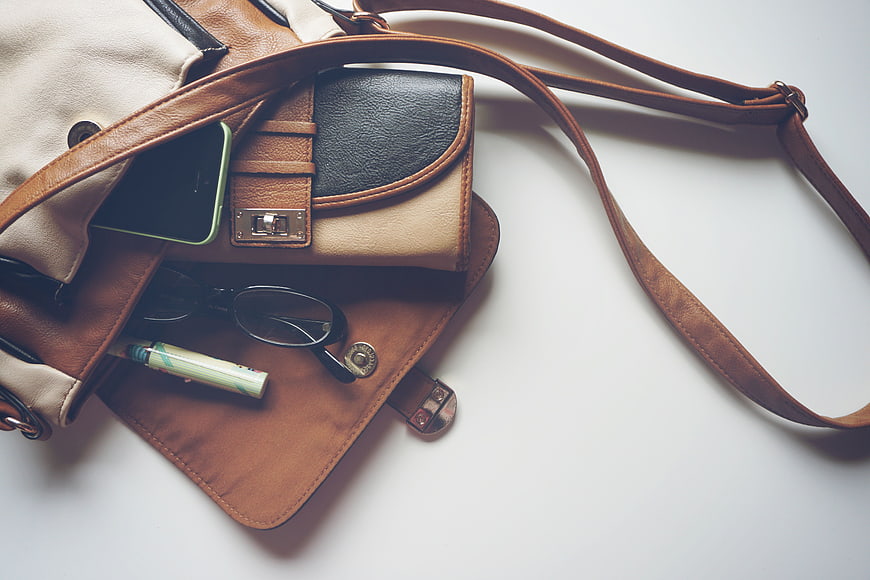 Brown Leather Handbag with Accessories Flat Lay