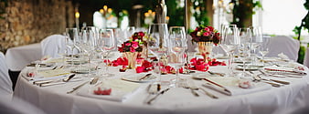 Elegant Wedding Reception Table Setting with Pink Flowers