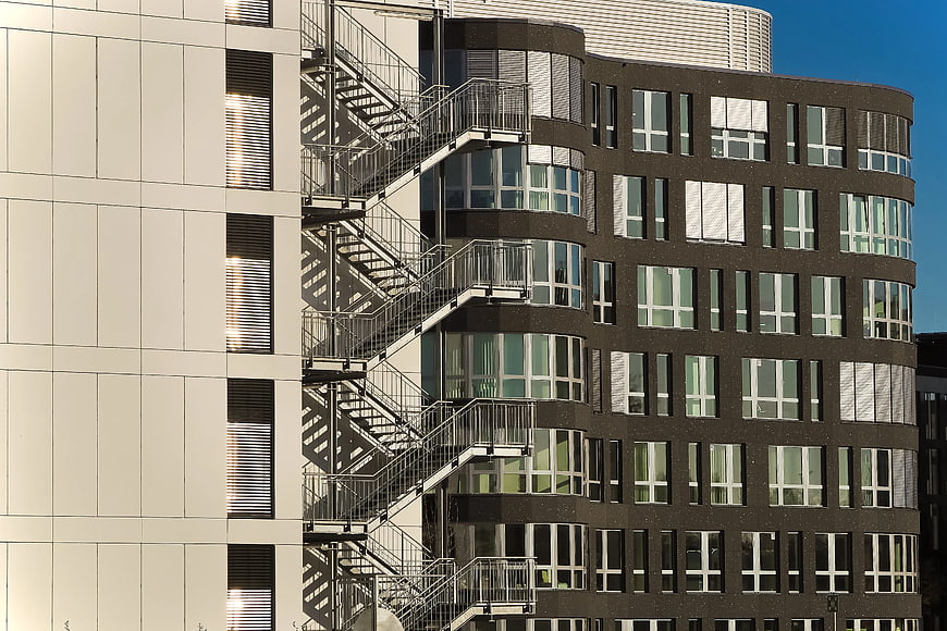 Modern Office Building with External Staircase and Windows
