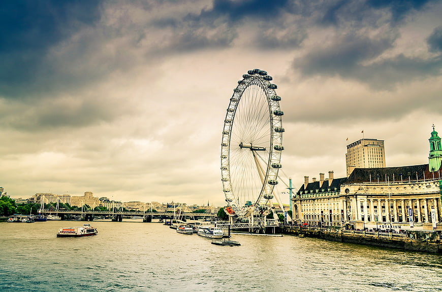 London Eye Ferris Wheel on River Thames with Boats