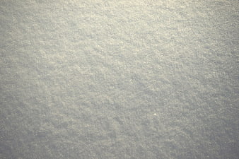 Close-up texture of fresh white snow surface