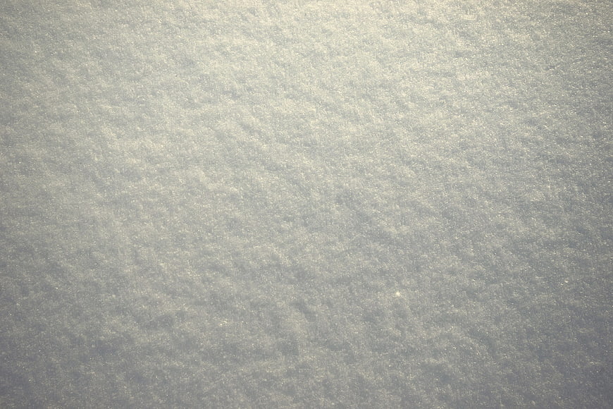 Close-up texture of fresh white snow surface