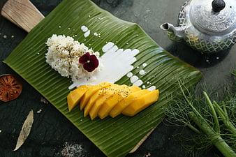 Mango Sticky Rice Dessert on Banana Leaf with Coconut Cream