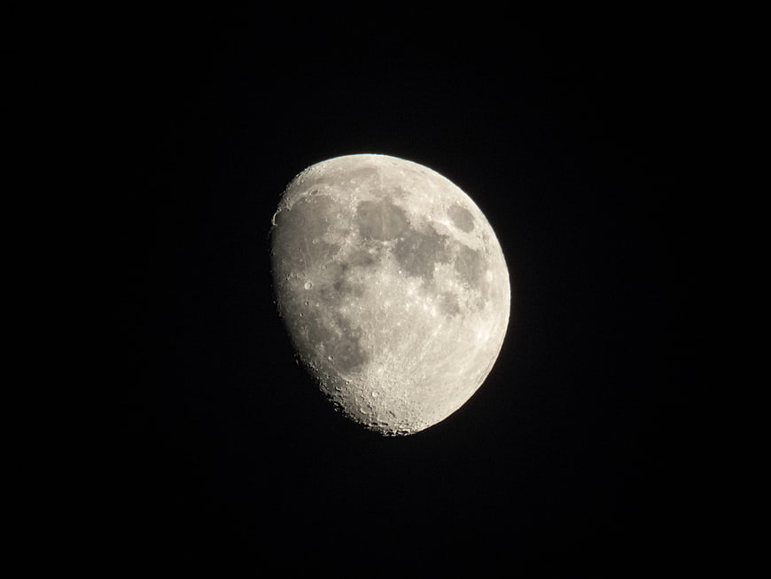 Close-Up of Gibbous Moon in Dark Night Sky