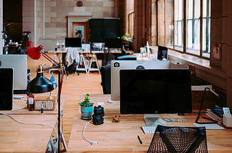 Modern Creative Office Workspace With Wooden Desks And Computers