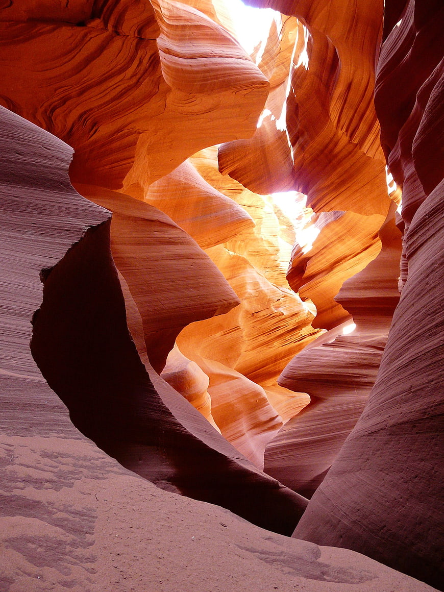 Sunlight streaming through Antelope Canyon sandstone walls