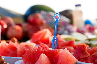 Fresh Watermelon Cubes with Blue Fork