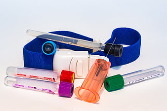 Medical blood collection kit with tubes and tourniquet