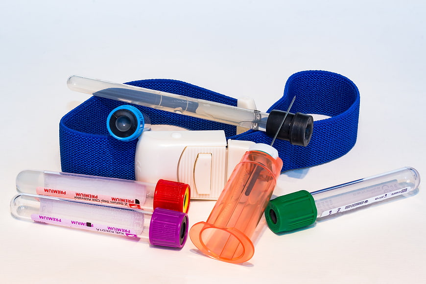 Medical blood collection kit with tubes and tourniquet