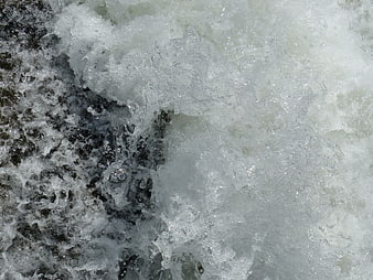 Close-up of turbulent white water rapids and foam