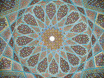 Intricate Persian mosaic ceiling with geometric Islamic patterns