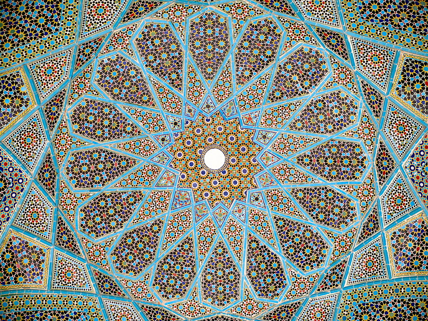 Intricate Persian mosaic ceiling with geometric Islamic patterns