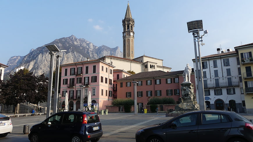 Piazza Cavour in Lecco, Italy with Bell Tower and Mountains