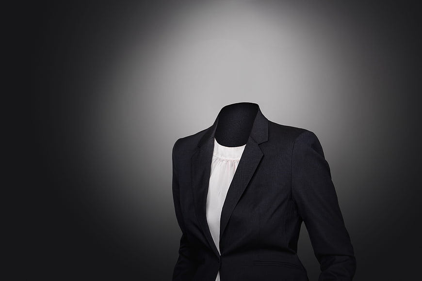 Headless woman business suit on gray background