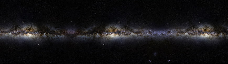 Panoramic view of the Milky Way galaxy with stars and nebulae