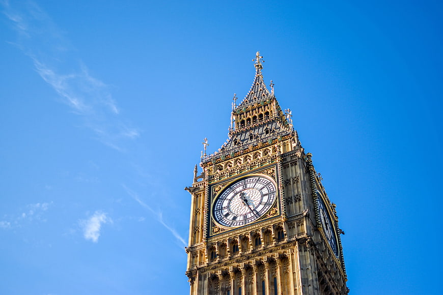 Low Angle View of Big Ben Clock Tower Against Blue Sky