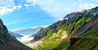 Panoramic View of Green Mountain Valley with Morning Mist