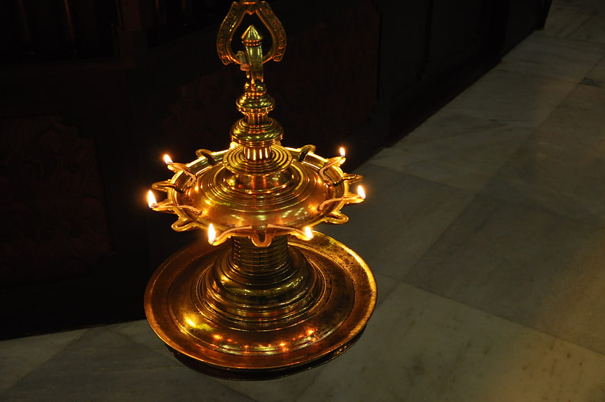 Traditional Brass Oil Lamp with Lit Flames
