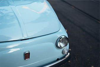 Close-up of Vintage Light Blue Fiat 500 Front Detail