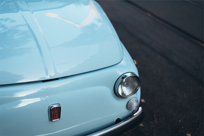 Close-up of Vintage Light Blue Fiat 500 Front Detail
