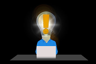 Businessman with lightbulb head and exclamation mark on laptop