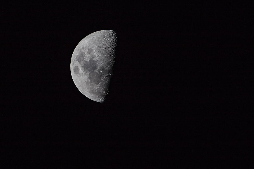 High-Resolution Telephoto Shot of a Waning Gibbous Moon