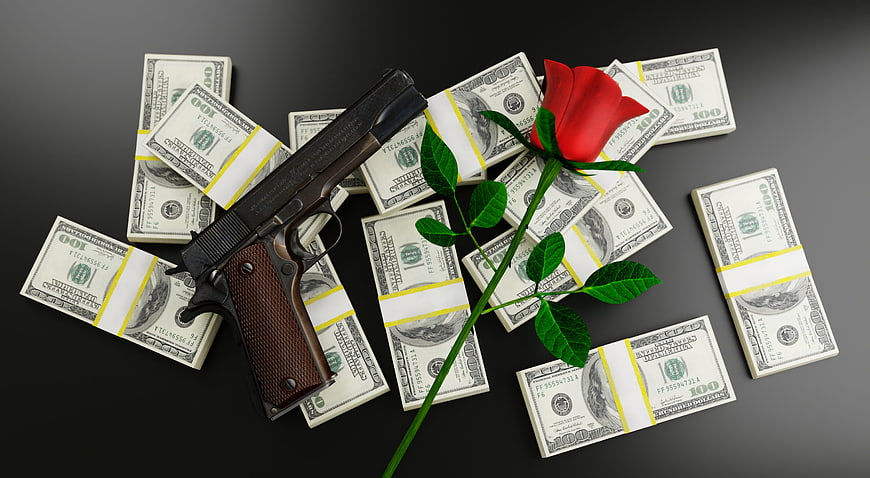 Pistol, red rose, and stacks of cash on dark background