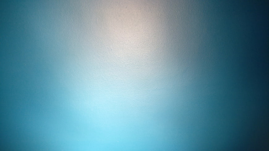 Textured Blue Gradient Background with Soft Light