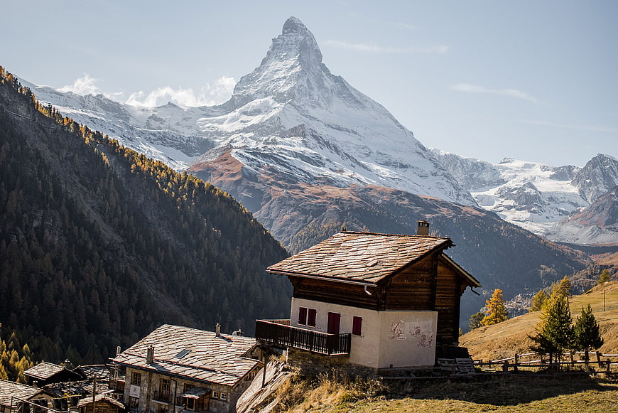 Matterhorn Mountain View With Alpine Village Houses In Switzerland