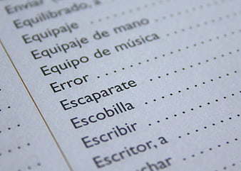 Close-up of Spanish dictionary page with word Error
