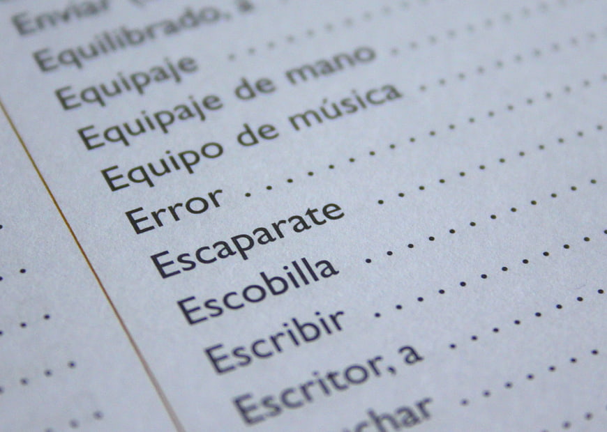 Close-up of Spanish dictionary page with word Error