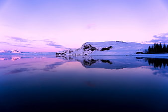 Serene Winter Lake with Snowy Mountain Reflection