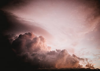 Dramatic Pink and Purple Storm Clouds at Sunset