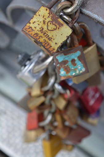 Rusty Love Locks on Chain Bridge Detail