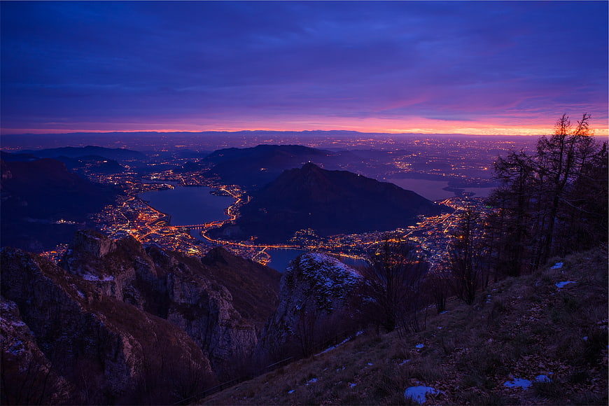 Panoramic Twilight View of Lake Como City Lights from Mountain
