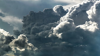 Dramatic Storm Clouds with Sunlight Breaking Through