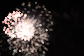 Abstract Bokeh Fireworks Explosion on Black Background