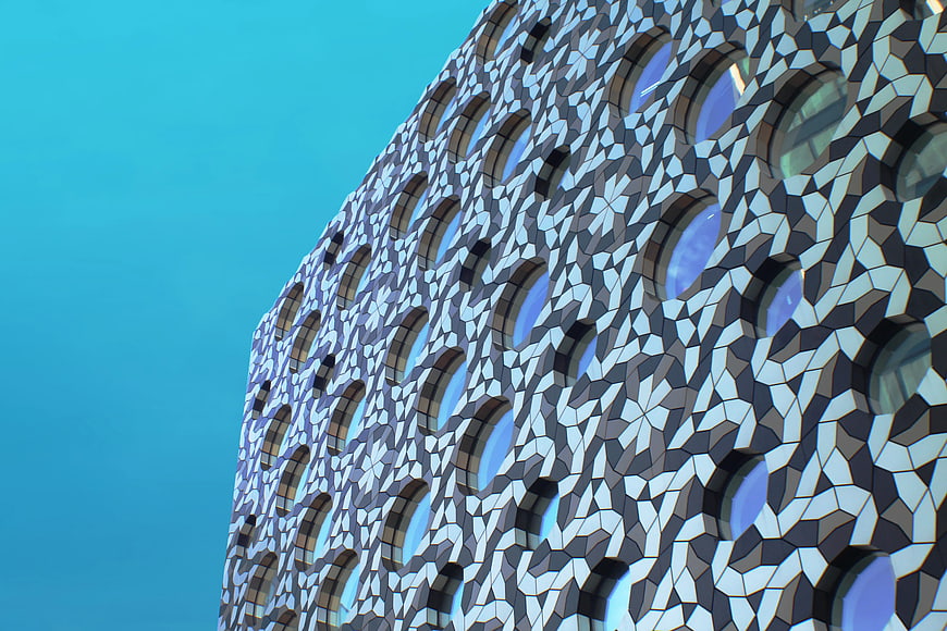 Modern geometric building facade with circular windows